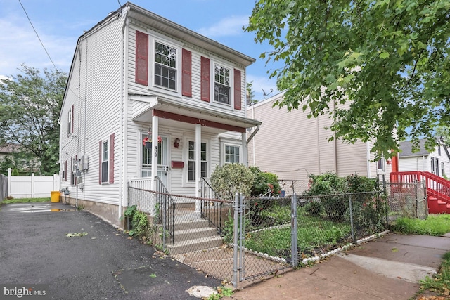 400 Reservoir St, Trenton, NJ 08618 - view of front facade with a fenced front yard, a porch, and a gate