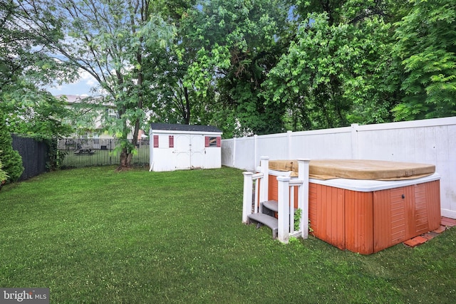 400 Reservoir St, Trenton, NJ 08618 - fenced backyard featuring a hot tub and a shed