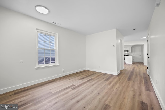 400 Reservoir St, Trenton, NJ 08618 - empty room with light wood-style flooring and baseboards