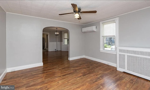 332 E Conestoga Rd, Wayne, PA 19087 - spare room with a wall mounted AC, arched walkways, crown molding, radiator heating unit, and ceiling fan