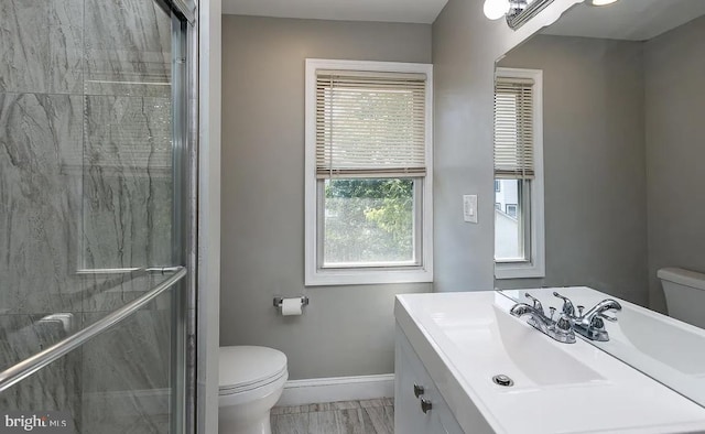 332 E Conestoga Rd, Wayne, PA 19087 - bathroom with vanity, a shower stall, plenty of natural light, and marble look tile flooring