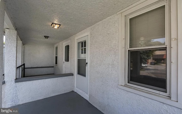 332 E Conestoga Rd, Wayne, PA 19087 - property entrance featuring stucco siding