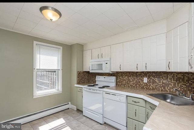 332 E Conestoga Rd, Wayne, PA 19087 - kitchen with white appliances, baseboard heating, backsplash, and light countertops