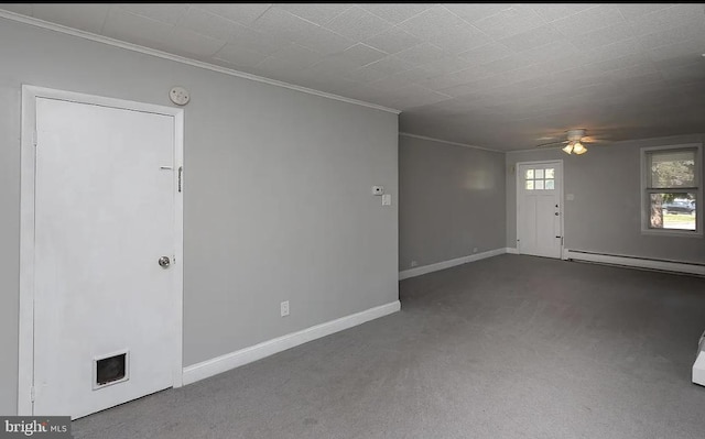 332 E Conestoga Rd, Wayne, PA 19087 - empty room featuring baseboard heating, carpet flooring, a ceiling fan, ornamental molding, and a smoke detector