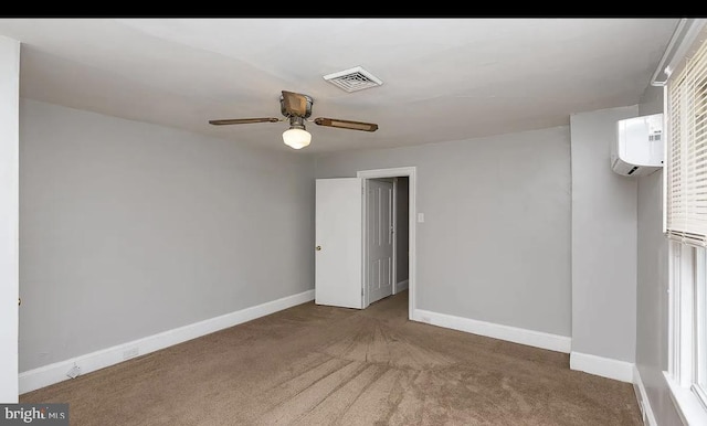 332 E Conestoga Rd, Wayne, PA 19087 - empty room with a wall unit AC, ceiling fan, and carpet floors