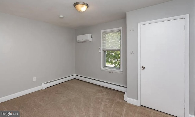 332 E Conestoga Rd, Wayne, PA 19087 - carpeted empty room featuring a wall mounted AC and baseboards