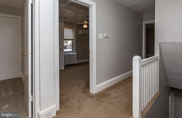 332 E Conestoga Rd, Wayne, PA 19087 - corridor with radiator, carpet, and a wall unit AC