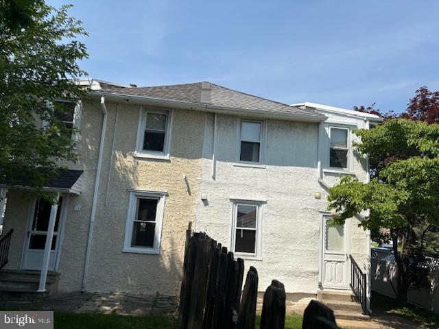 332 E Conestoga Rd, Wayne, PA 19087 - rear view of house with stucco siding
