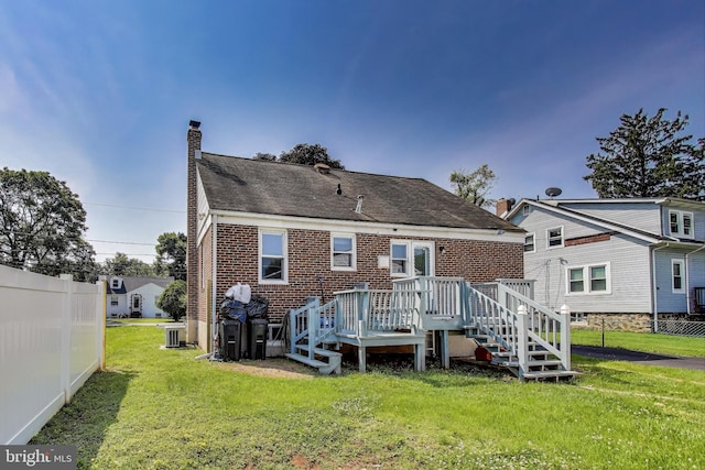 3520 Meadowside Rd, Gwynn Oak, MD 21207 - back of house with a chimney, a wooden deck, brick siding, and a shingled roof