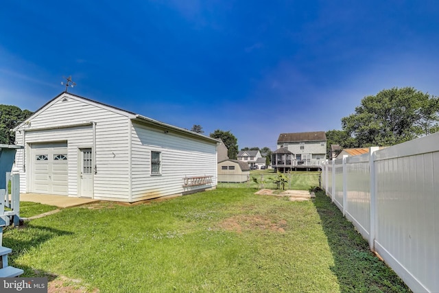 3520 Meadowside Rd, Gwynn Oak, MD 21207 - view of yard with an outdoor structure and a detached garage