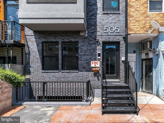 505 Kennedy St NW Unit B02, Washington, DC 20011 - view of exterior entry featuring brick siding