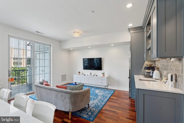 406 Regatta Dr, Philadelphia, PA 19146 - living room with dark wood finished floors and recessed lighting