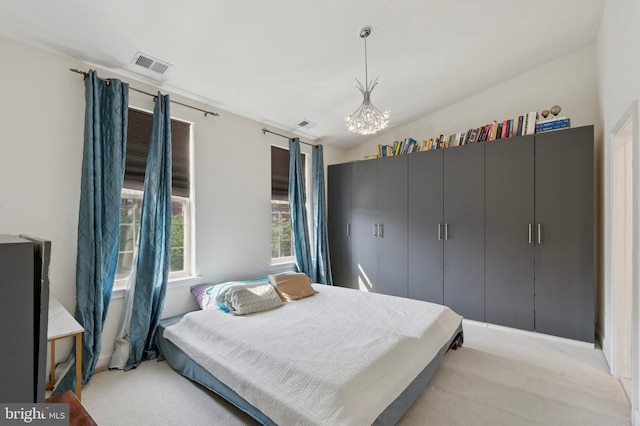406 Regatta Dr, Philadelphia, PA 19146 - bedroom with light colored carpet and a chandelier