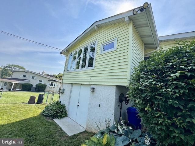 2108 Sierra Rd, Plymouth Meeting, PA 19462 - view of home's exterior with a yard and stucco siding