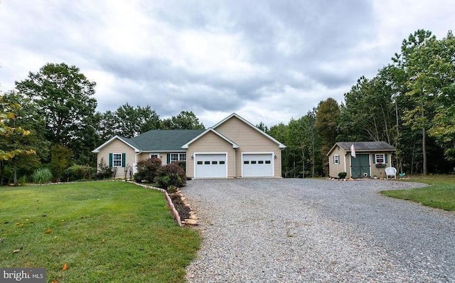 108 Shannon Glen Ct, Louisa, VA 23093 - ranch-style home featuring gravel driveway, a front yard, a garage, and a shed