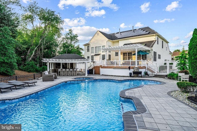 22 Tara Dr, Sewell, NJ 08080 - view of swimming pool featuring a pergola, a wooden deck, a patio area, and a pool with connected hot tub