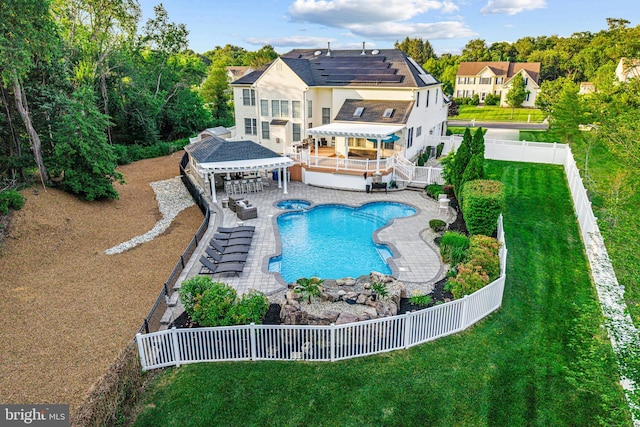22 Tara Dr, Sewell, NJ 08080 - rear view of property with a fenced backyard, a pool with connected hot tub, a pergola, a patio area, and outdoor dining space