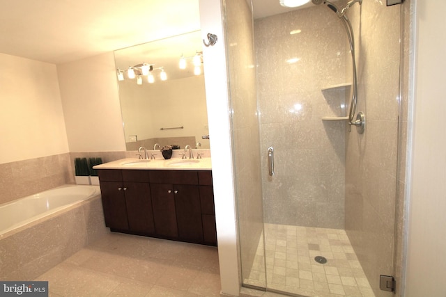 12500 Park Potomac Ave Unit 409, Potomac, MD 20854 - bathroom featuring a bath, a shower stall, and double vanity