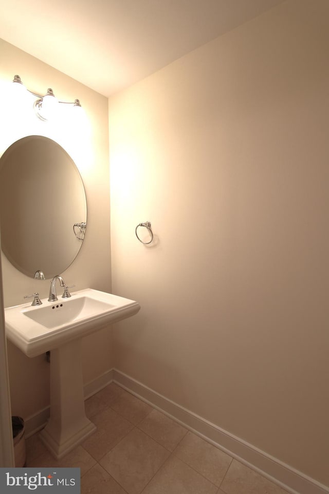 12500 Park Potomac Ave Unit 409, Potomac, MD 20854 - bathroom featuring baseboards and tile patterned flooring