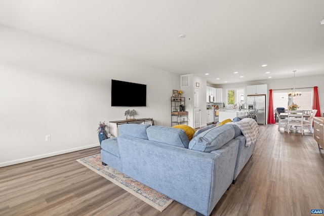 3028 Horizon Rd, Charlottesville, VA 22902 - living room featuring dark wood-type flooring, recessed lighting, and a chandelier