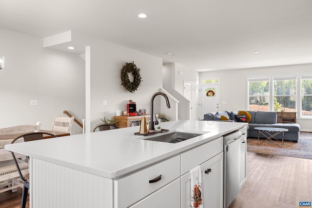 3028 Horizon Rd, Charlottesville, VA 22902 - kitchen with light wood-style flooring, open floor plan, white cabinets, recessed lighting, and dishwasher