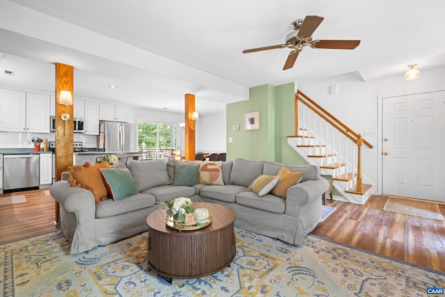 295 Homestead Ln, Charlottesville, VA 22902 - living area with light wood-type flooring, stairs, and a ceiling fan