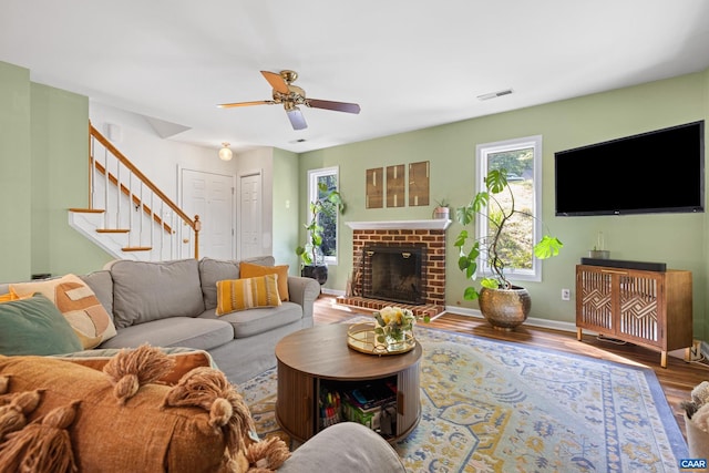 295 Homestead Ln, Charlottesville, VA 22902 - living area featuring healthy amount of natural light, stairs, wood finished floors, and ceiling fan