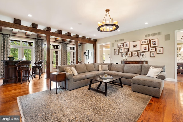 3054 Jordan Rd, Orefield, PA 18069 - living room featuring wood finished floors, recessed lighting, a chandelier, and french doors