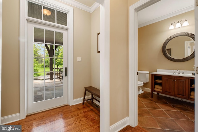 3054 Jordan Rd, Orefield, PA 18069 - entryway with crown molding and dark tile patterned floors