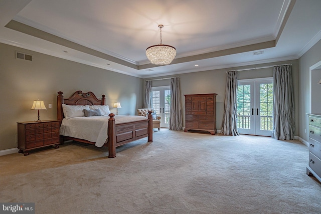 3054 Jordan Rd, Orefield, PA 18069 - carpeted bedroom with a tray ceiling, french doors, crown molding, access to exterior, and a chandelier