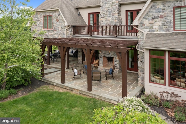 3054 Jordan Rd, Orefield, PA 18069 - view of patio / terrace with a pergola, a fireplace, and french doors