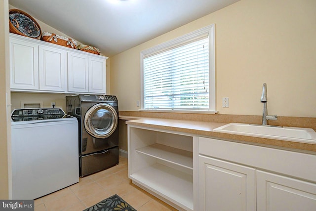 3054 Jordan Rd, Orefield, PA 18069 - laundry room featuring washing machine and dryer, cabinet space, and light tile patterned flooring