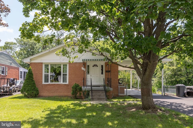 412 Fairview Ave, Winchester, VA 22601 - bungalow with a front yard and brick siding