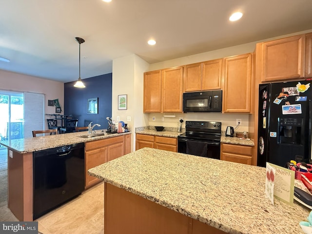 45657 Bethfield Way, California, MD 20619 - kitchen with black appliances, a peninsula, light brown cabinetry, light stone counters, and hanging light fixtures