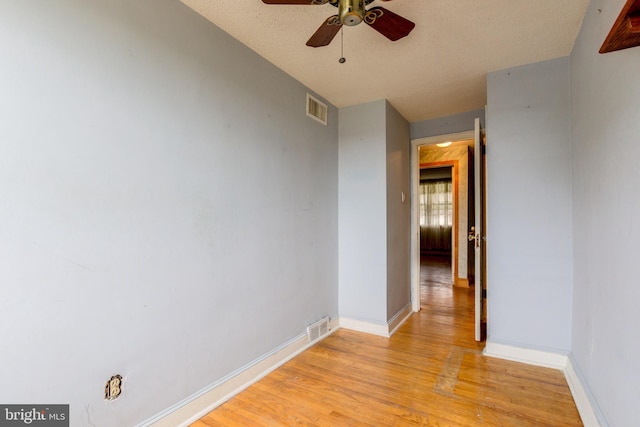 257 Westpark Ln, Clifton Heights, PA 19018 - spare room featuring light wood finished floors, ceiling fan, and a textured ceiling