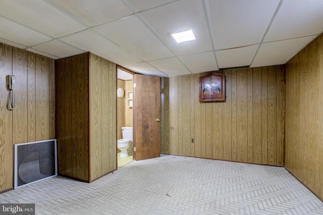 257 Westpark Ln, Clifton Heights, PA 19018 - finished basement featuring a drop ceiling, wooden walls, and carpet