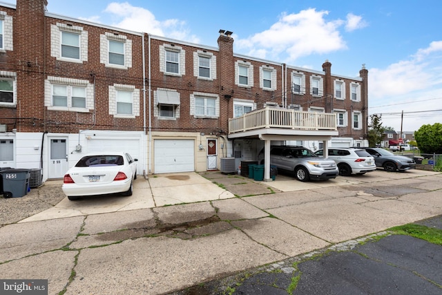 257 Westpark Ln, Clifton Heights, PA 19018 - view of building exterior with an attached garage and driveway