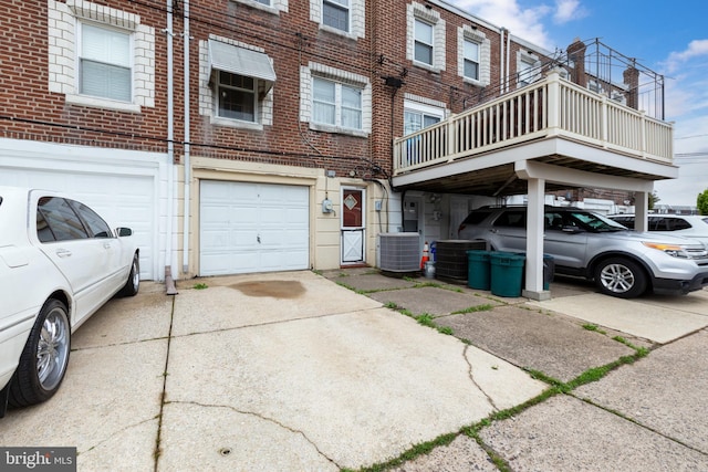 257 Westpark Ln, Clifton Heights, PA 19018 - view of home's exterior featuring brick siding, driveway, and a garage