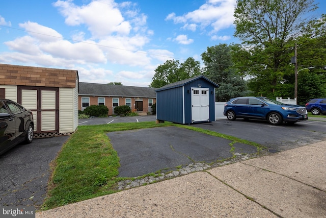 257 Westpark Ln, Clifton Heights, PA 19018 - view of vehicle parking featuring a storage unit