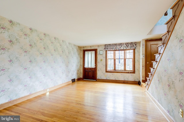 257 Westpark Ln, Clifton Heights, PA 19018 - unfurnished room featuring light wood-type flooring, stairway, and wallpapered walls