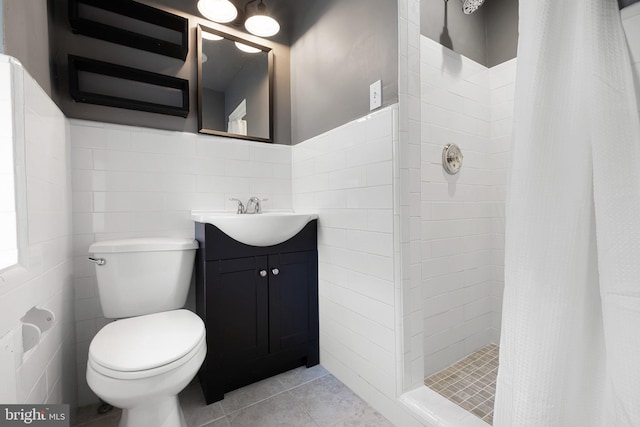 14 Brandywine Blvd, Wilmington, DE 19809 - full bath featuring tile walls, tiled shower, vanity, tile patterned floors, and a wainscoted wall