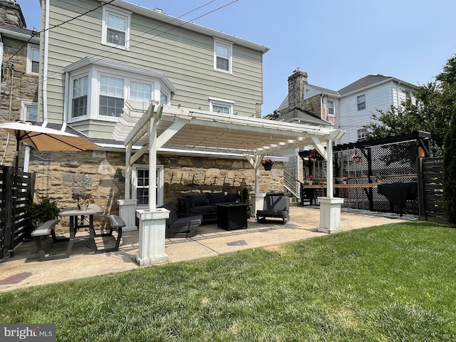 14 Brandywine Blvd, Wilmington, DE 19809 - rear view of property with outdoor lounge area, a patio, and stone siding