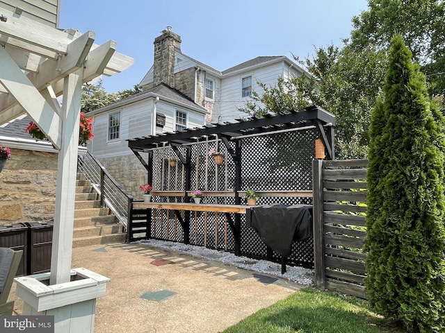 14 Brandywine Blvd, Wilmington, DE 19809 - rear view of house with a pergola, stairs, and a patio