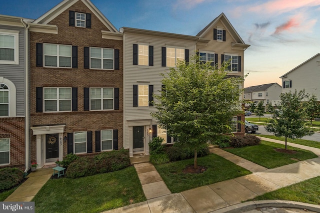 6203 Posey St, Frederick, MD 21703 - multi unit property featuring brick siding and a front yard