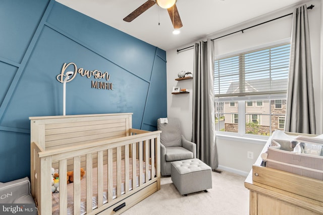 6203 Posey St, Frederick, MD 21703 - bedroom with light colored carpet, a crib, and ceiling fan