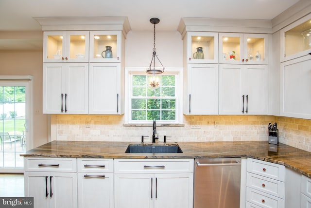 3879 Charter Club Dr, Doylestown, PA 18902 - kitchen featuring stainless steel dishwasher, white cabinets, dark stone counters, and hanging light fixtures