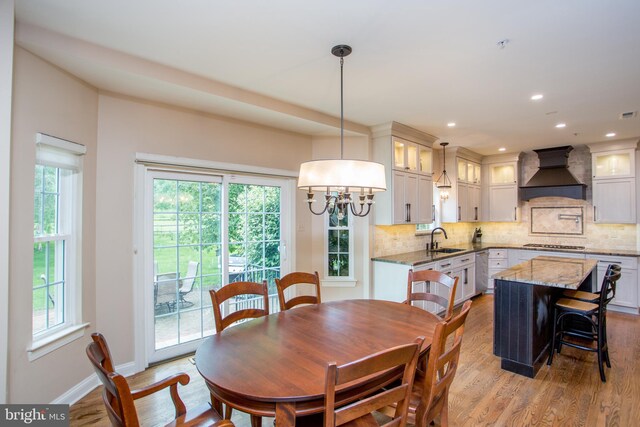 3879 Charter Club Dr, Doylestown, PA 18902 - dining room featuring healthy amount of natural light, light wood-type flooring, a chandelier, and recessed lighting