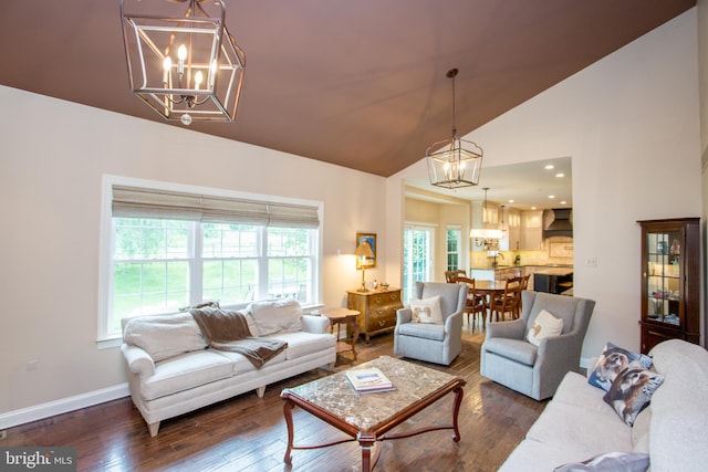 3879 Charter Club Dr, Doylestown, PA 18902 - living room featuring a chandelier, wood-type flooring, and high vaulted ceiling