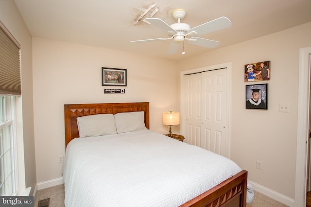 3879 Charter Club Dr, Doylestown, PA 18902 - bedroom with light carpet, a closet, and ceiling fan