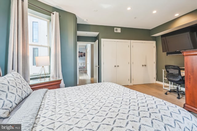 3240 Hiatt Pl NW Unit 4, Washington, DC 20010 - bedroom featuring wood finished floors, multiple closets, and recessed lighting
